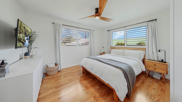 3189 Hikina Rd, Koloa, HI 96756 - bedroom with light wood finished floors and ceiling fan