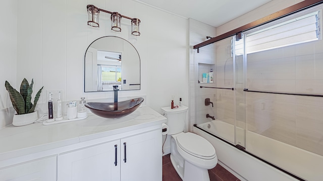 3189 Hikina Rd, Koloa, HI 96756 - full bath with vanity, bath / shower combo with glass door, healthy amount of natural light, and toilet