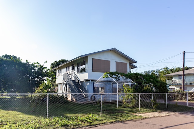 4486 Iona Rd, Hanapepe, HI 96716 - view of front facade featuring stairway