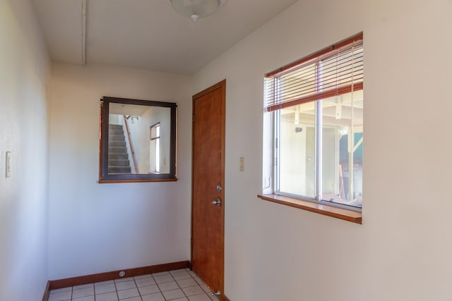 4486 Iona Rd, Hanapepe, HI 96716 - corridor featuring baseboards and light tile patterned floors