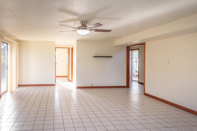 4486 Iona Rd, Hanapepe, HI 96716 - spare room with a ceiling fan, baseboards, and light tile patterned floors