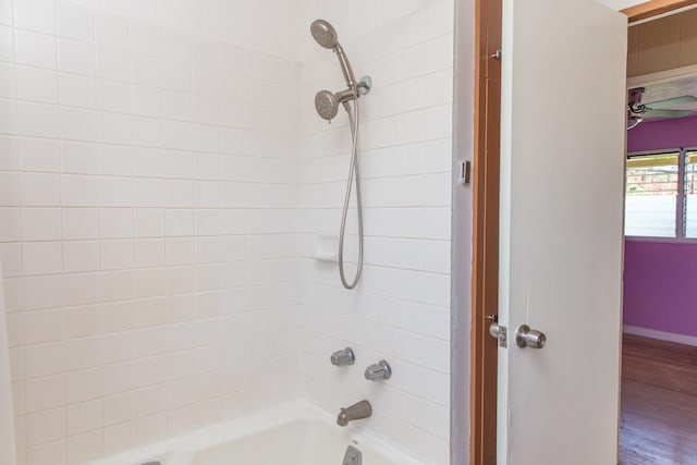 4486 Iona Rd, Hanapepe, HI 96716 - bathroom with tub / shower combination, wood finished floors, and baseboards