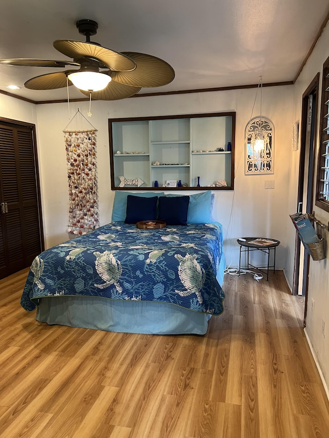 173 Opio Rd, Hilo, HI 96720 - bedroom featuring wood finished floors, ceiling fan, and baseboards