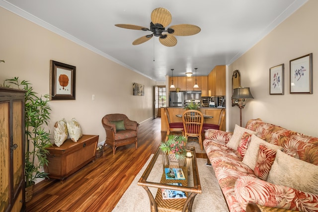 3411 Wilcox Rd Unit Aiii9, Lihue, HI 96766 - living room featuring crown molding, dark wood-style flooring, ceiling fan, and baseboards