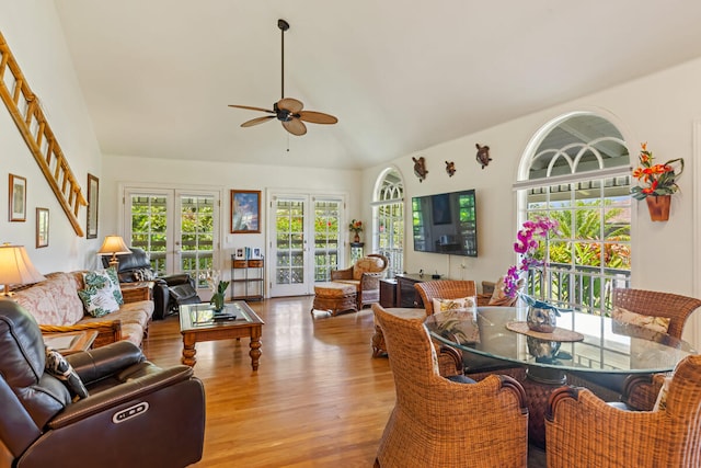 5145 Kapiolani Lp, Princeville, HI 96722 - dining space featuring french doors, wood finished floors, ceiling fan, and high vaulted ceiling