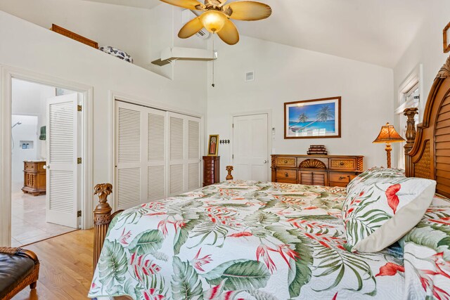 5145 Kapiolani Lp, Princeville, HI 96722 - bedroom featuring a closet, high vaulted ceiling, light wood-type flooring, ceiling fan, and ensuite bathroom