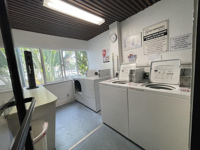 75-5680 Kuakini Hwy Unit 203, Kailua-Kona, HI 96740 - communal laundry room with washer and clothes dryer