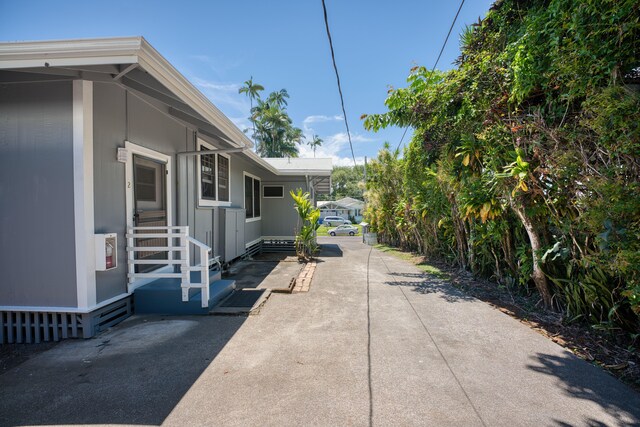 332 Kauila St Unit 1-4, Hilo, HI 96720 - view of side of property with entry steps