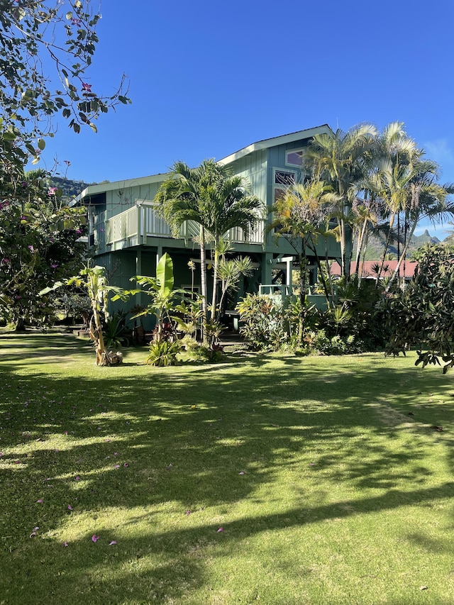 7359 Alealea Rd, Hanalei, HI 96714 - view of green lawn featuring a balcony