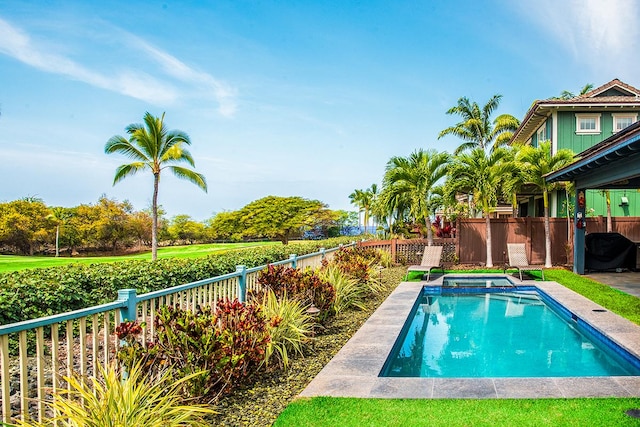 78-106 Holuakai St, Kailua-Kona, HI 96740 - view of pool with a fenced backyard and a pool with connected hot tub