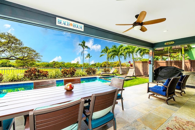 78-106 Holuakai St, Kailua-Kona, HI 96740 - fenced backyard featuring a patio, outdoor dining space, and a ceiling fan