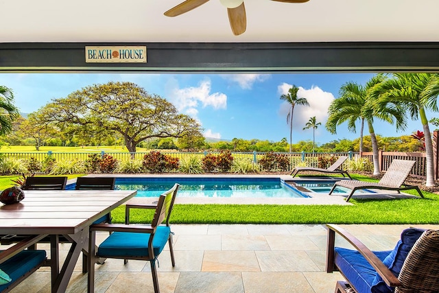 78-106 Holuakai St, Kailua-Kona, HI 96740 - view of pool featuring ceiling fan, a patio, a fenced backyard, outdoor dining area, and a pool with connected hot tub