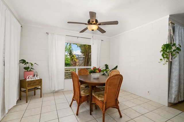 8562-B Elepaio Rd, Kekaha, HI 96752 - dining area featuring a ceiling fan, light tile patterned floors, and ornamental molding