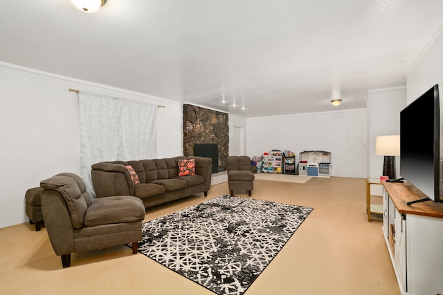 8562-B Elepaio Rd, Kekaha, HI 96752 - living room with a stone fireplace, concrete block wall, and concrete flooring