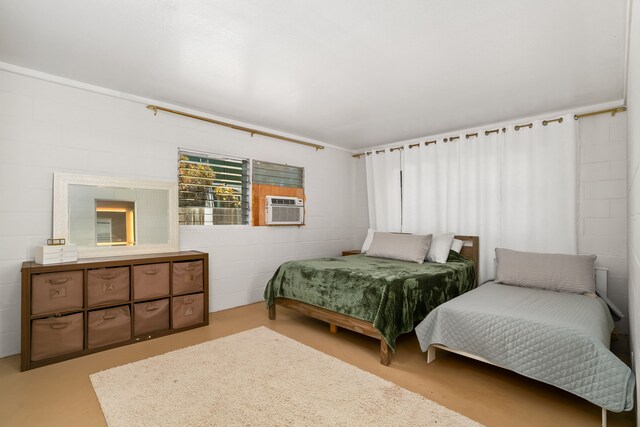 8562-B Elepaio Rd, Kekaha, HI 96752 - bedroom featuring cooling unit and concrete block wall