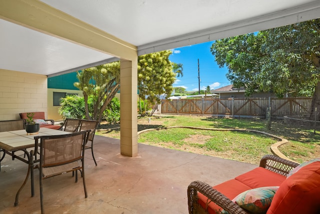 8562-B Elepaio Rd, Kekaha, HI 96752 - fenced backyard featuring a patio and outdoor dining space
