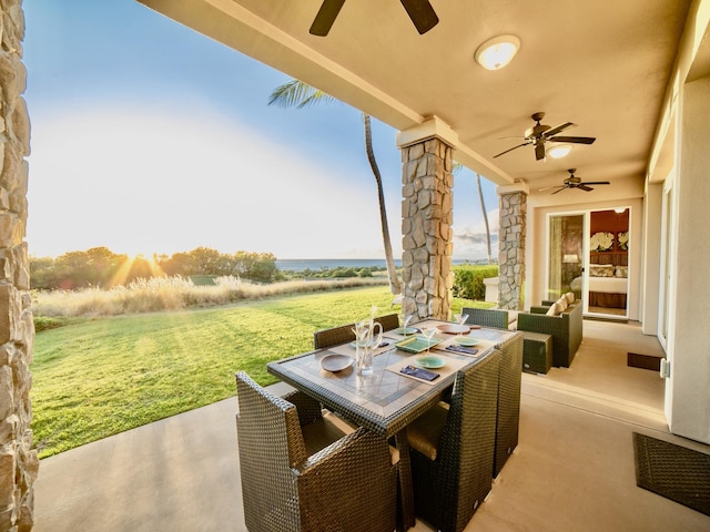 62-3614 Lolii Way Unit E-2, Kamuela, HI 96743 - view of patio / terrace with a ceiling fan, outdoor dining area, and a water view