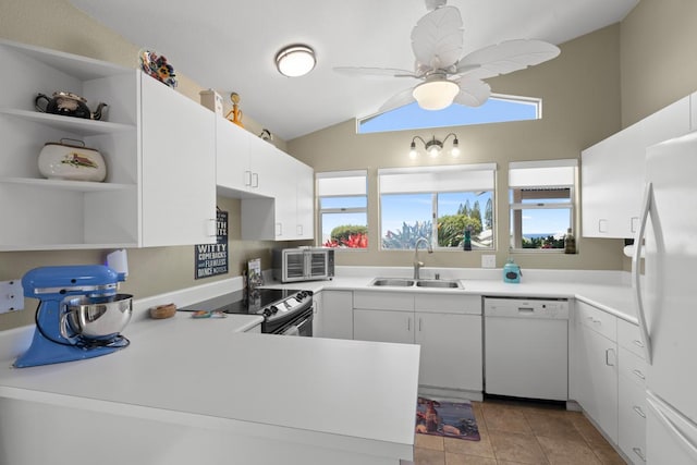 75-217 Nani Kailua Dr Unit 149, Kailua-Kona, HI 96740 - kitchen featuring white appliances, a sink, open shelves, vaulted ceiling, and light tile patterned floors