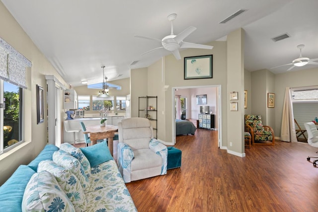 75-217 Nani Kailua Dr Unit 149, Kailua-Kona, HI 96740 - living area with a ceiling fan, plenty of natural light, wood finished floors, high vaulted ceiling, and baseboards