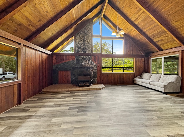 94-2664 Lorenzo Rd, Naalehu, HI 96772 - unfurnished sunroom with a wood stove