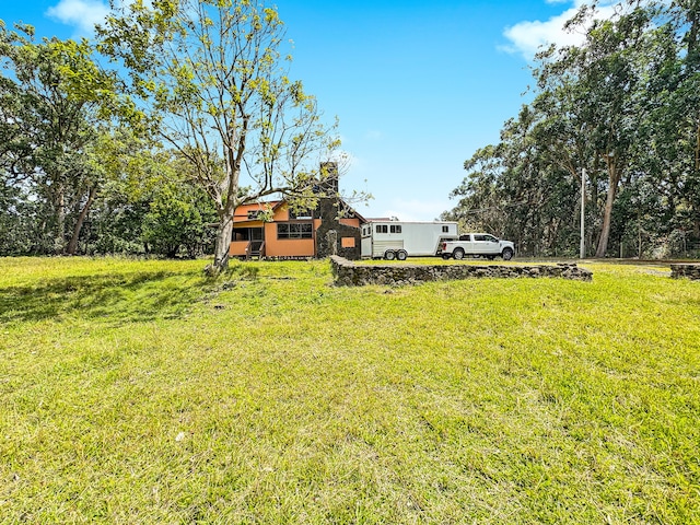 94-2664 Lorenzo Rd, Naalehu, HI 96772 - view of grassy yard