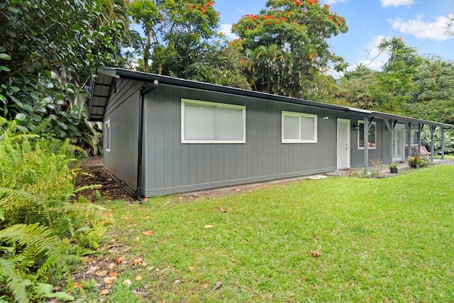 14-3479 Nanawale Blvd, Pahoa, HI 96778 - view of front of home with a front yard