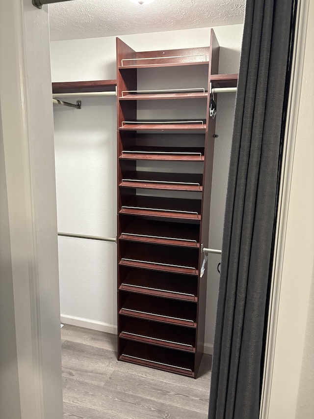 15-1509 22nd Ave, Keaau, HI 96749 - spacious closet featuring wood finished floors