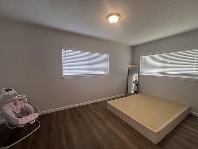 15-1509 22nd Ave, Keaau, HI 96749 - bedroom with dark wood finished floors and baseboards