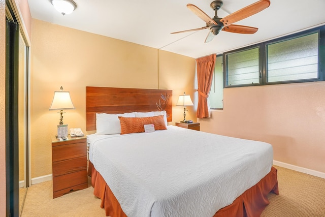 5017 Lawai Rd Unit C202, Koloa, HI 96756 - bedroom with light carpet, baseboards, and a ceiling fan