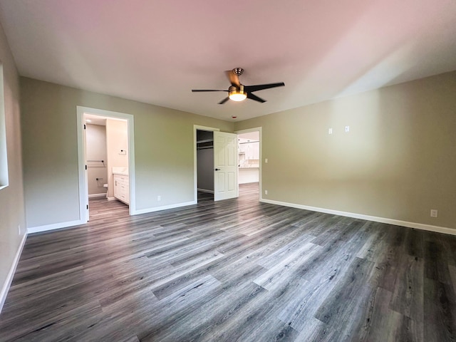 15-1878 31st Ave, Keaau, HI 96749 - unfurnished bedroom featuring baseboards, dark wood-type flooring, and ensuite bath