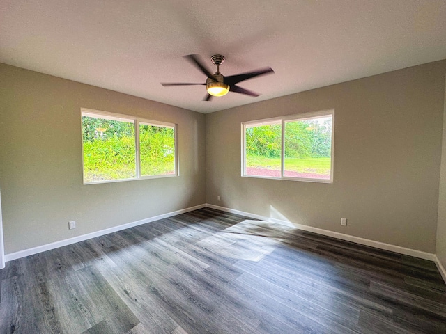 15-1878 31st Ave, Keaau, HI 96749 - empty room with ceiling fan, baseboards, and dark wood-type flooring