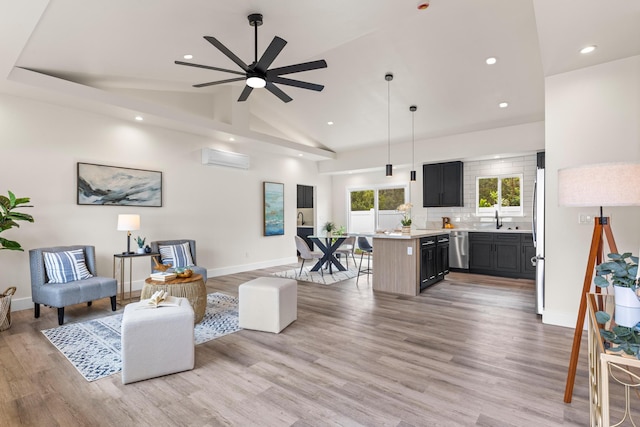 16-2072 Bamboo Dr, Pahoa, HI 96778 - living room featuring ceiling fan, a wall mounted air conditioner, recessed lighting, light wood-type flooring, and baseboards