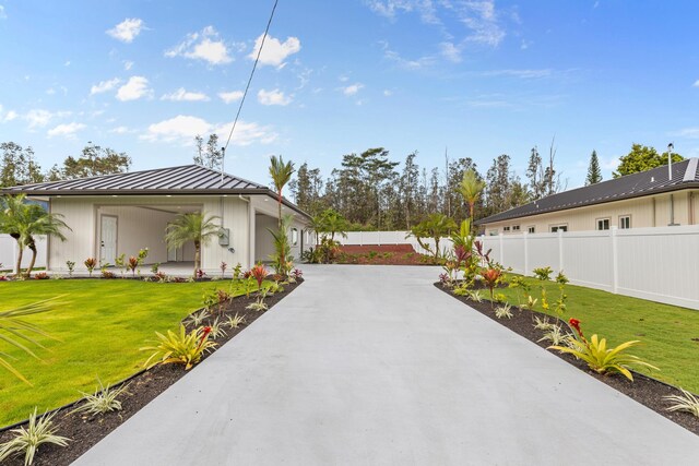 16-2072 Bamboo Dr, Pahoa, HI 96778 - view of side of property featuring a standing seam roof and metal roof