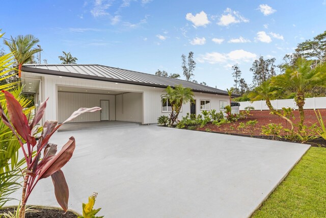 16-2072 Bamboo Dr, Pahoa, HI 96778 - ranch-style home featuring a standing seam roof, driveway, and metal roof