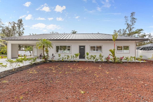 16-2072 Bamboo Dr, Pahoa, HI 96778 - view of front facade with a standing seam roof, an attached carport, metal roof, and driveway