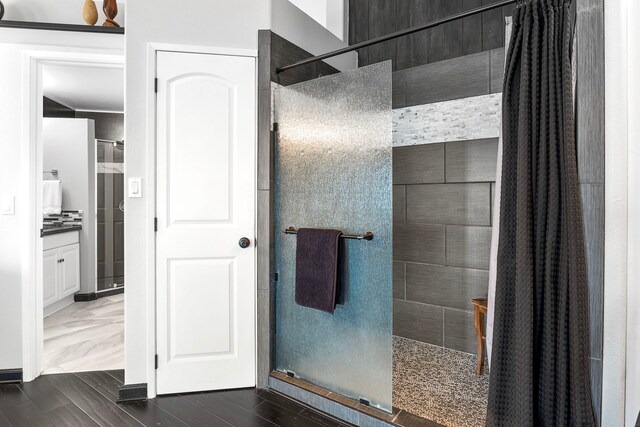 73-1238 Kaiminani Dr, Kailua-Kona, HI 96740 - full bathroom with walk in shower, vanity, and wood finished floors