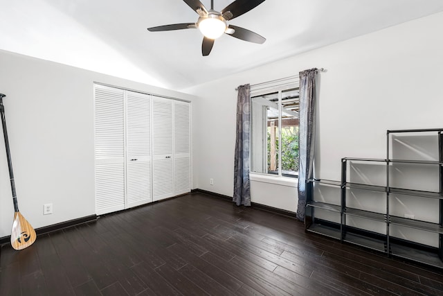 73-1238 Kaiminani Dr, Kailua-Kona, HI 96740 - unfurnished bedroom with baseboards, wood finished floors, a ceiling fan, and a closet