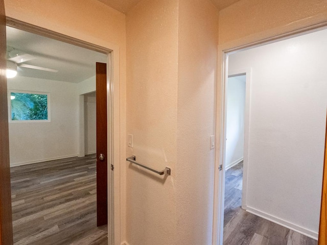 15-2746 Lai St, Pahoa, HI 96778 - hallway with dark wood-style flooring and baseboards