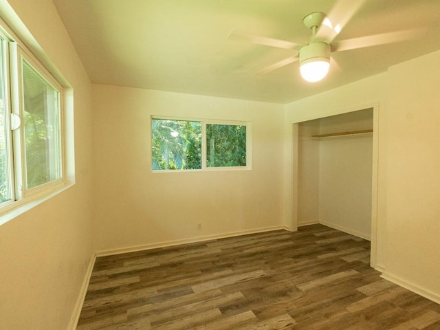 15-2746 Lai St, Pahoa, HI 96778 - unfurnished bedroom with dark wood finished floors, baseboards, a closet, and ceiling fan