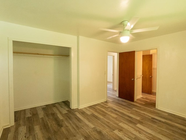 15-2746 Lai St, Pahoa, HI 96778 - unfurnished bedroom featuring dark wood finished floors, a closet, and baseboards