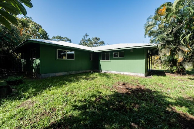 15-2746 Lai St, Pahoa, HI 96778 - view of front of property featuring a front yard and metal roof