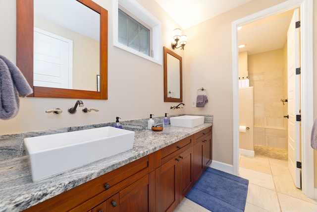 78-120 Holuakai St, Kailua-Kona, HI 96740 - bathroom featuring a walk in shower, double vanity, tile patterned flooring, and baseboards