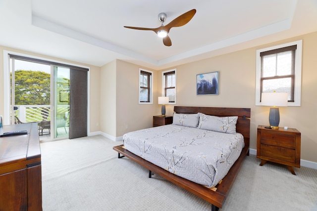 78-120 Holuakai St, Kailua-Kona, HI 96740 - bedroom featuring a raised ceiling, light carpet, and multiple windows