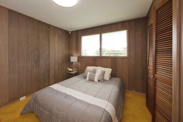 27-296 Kaieie Rd, Papaikou, HI 96781 - bedroom with light colored carpet, wooden walls, and a closet