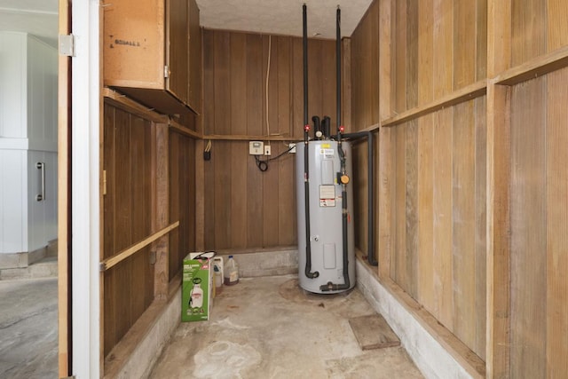 27-296 Kaieie Rd, Papaikou, HI 96781 - below grade area featuring water heater and wood walls