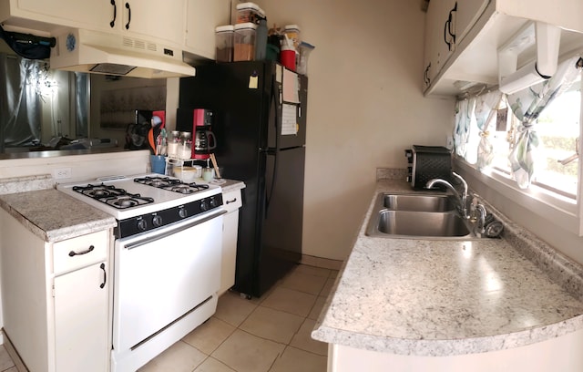 75-5724 Alahou St Unit 202A, Kailua-Kona, HI 96740 - kitchen with white gas range, under cabinet range hood, a sink, and light countertops