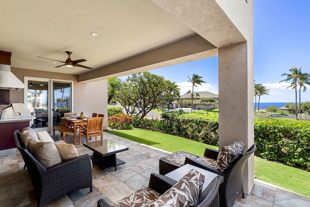 62-3600 Amaui Pl Unit F102, Kamuela, HI 96743 - view of patio featuring an outdoor living space, a ceiling fan, and outdoor dining space
