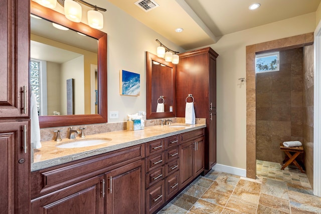 62-3600 Amaui Pl Unit F102, Kamuela, HI 96743 - full bath featuring healthy amount of natural light, double vanity, stone tile flooring, walk in shower, and recessed lighting