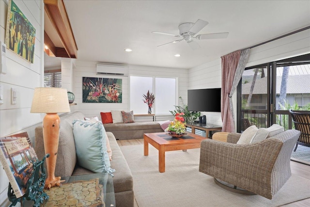 78-261 Manukai St Unit 3403, Kailua-Kona, HI 96740 - living area with an AC wall unit, ceiling fan, wood finished floors, and recessed lighting