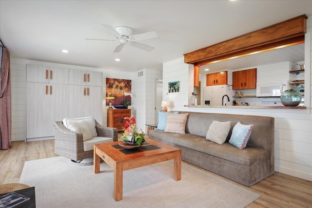 78-261 Manukai St Unit 3403, Kailua-Kona, HI 96740 - living area with light wood-style flooring, a ceiling fan, and recessed lighting